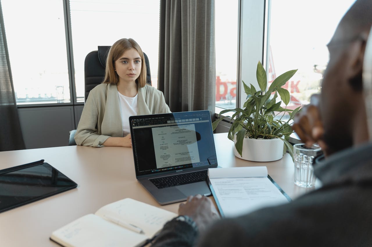 Mastering the First Impression: Your intriguing post title goes here A professional job interview scene in a modern office setting, emphasizing recruitment and career opportunities.
